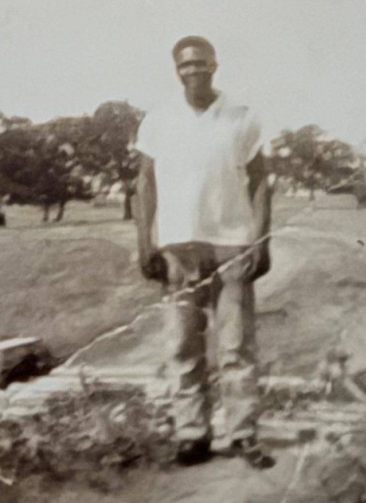 Damaged photo — before